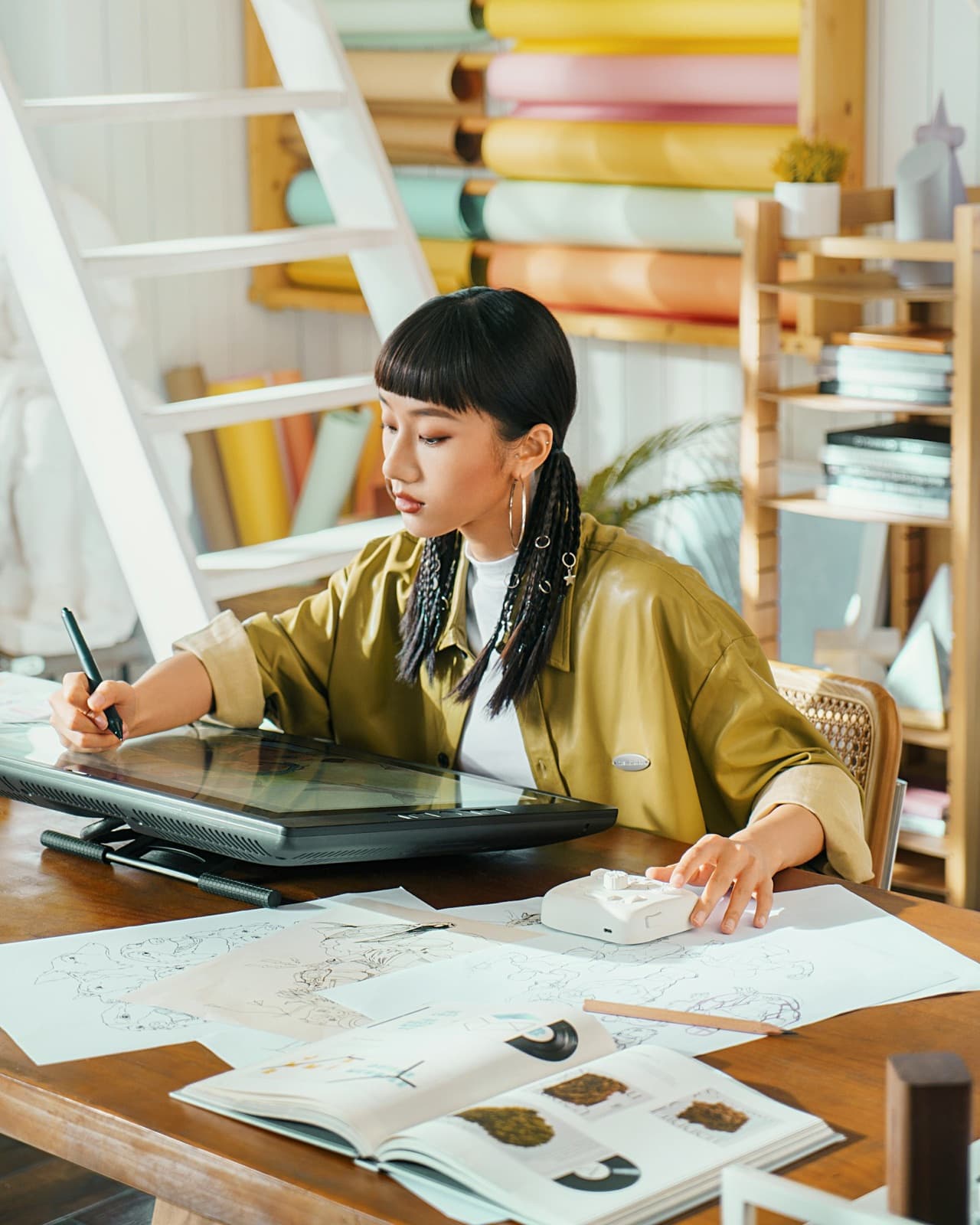 A designer drawing on a pen display